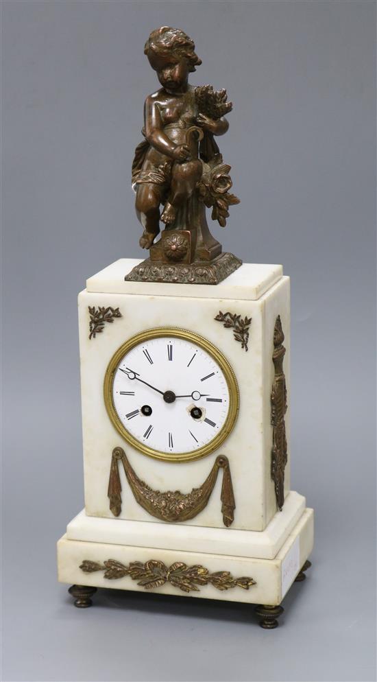 A white marble gilt mounted mantel clock with putti surmount height 39cm